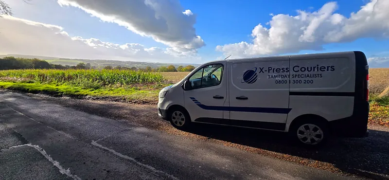 X-Press Couriers van on the road during a same-day delivery